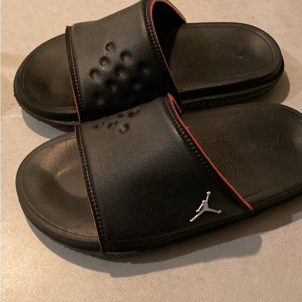 Jordan Black Slide Sandals with Red Trim and Silver Logo